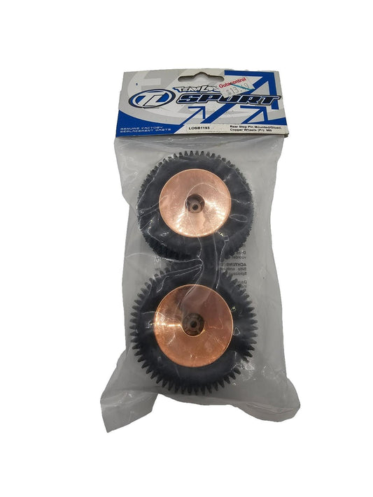 Losi rear step pin tires on copper colored wheels for mini baja NOS #LOSB1193