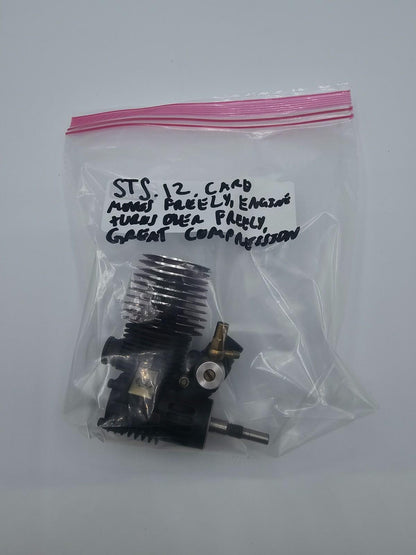 Vintage STS Racing .12 Nitro motor carb moves freely, great compression untested