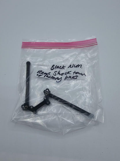 Axial Exo Terra rear black aluminum shock tower with original links