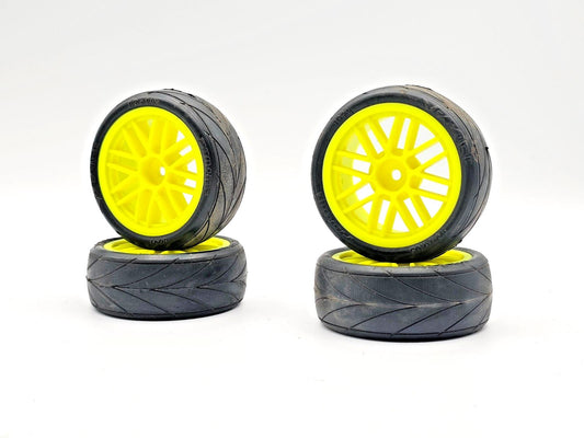 1/10th scale Proline V-rage tires on yellow 12mm hex wheels, multi-spoke not ran
