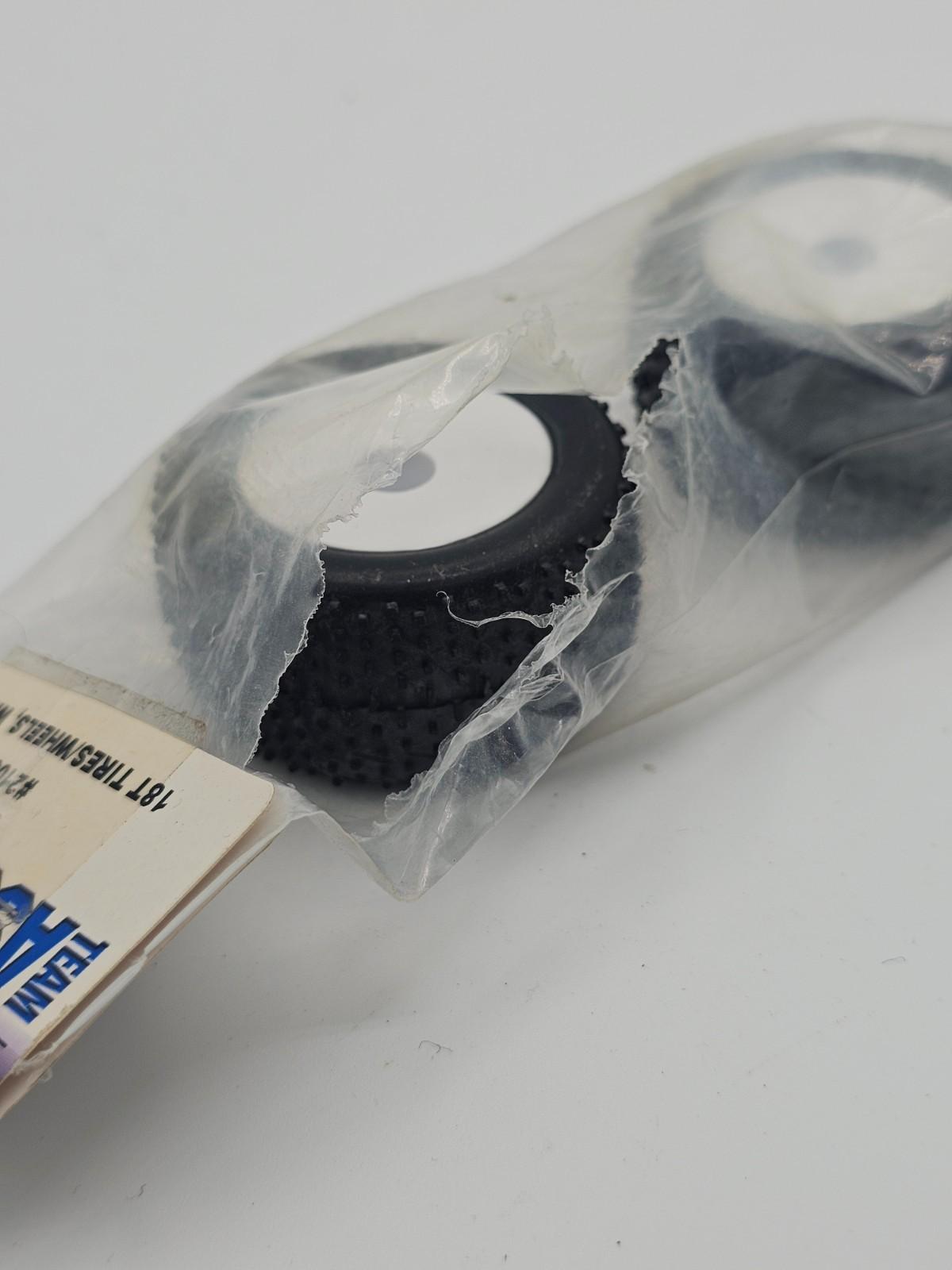 Team Associated  mini pin tires on white wheels rc18 1/18th scale #21060 ripped