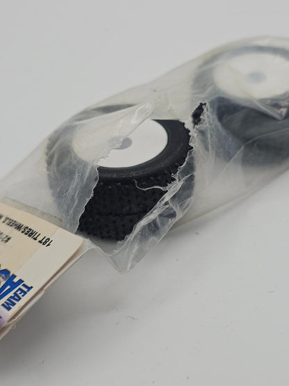 Team Associated  mini pin tires on white wheels rc18 1/18th scale #21060 ripped
