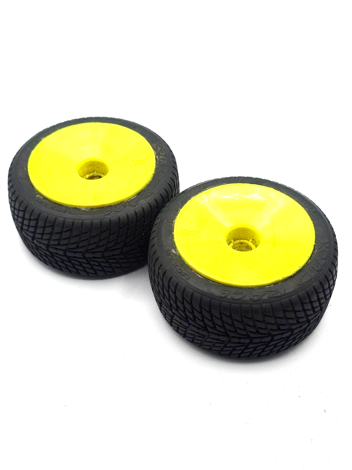 Pro-Line Road rage 1/10th scale tires on yellow bearing type wheels