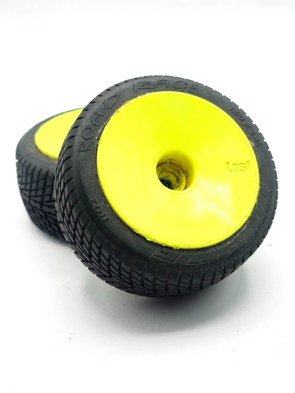 Pro-Line Road rage 1/10th scale tires on yellow bearing type wheels