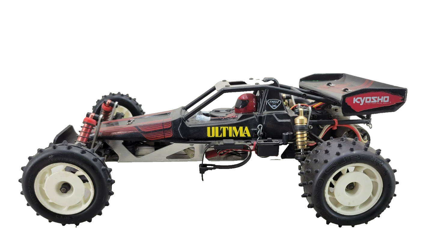 Team Kyosho Ultima 1/10th scale buggy, black and red