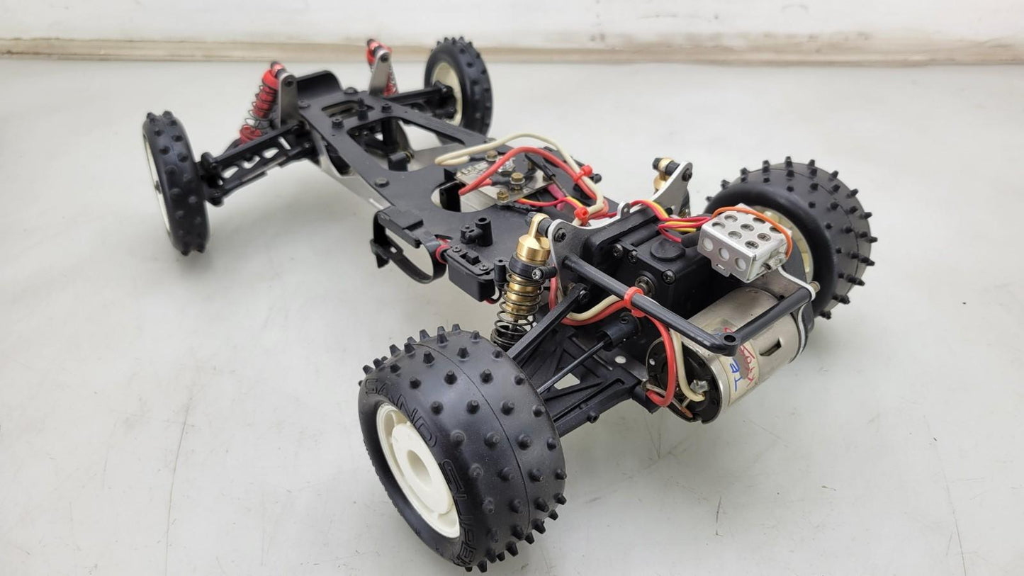 Team Kyosho Ultima 1/10th scale buggy, black and red