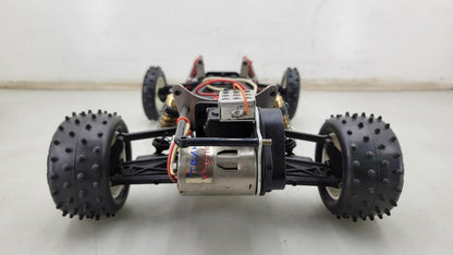 Team Kyosho Ultima 1/10th scale buggy, black and red