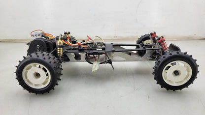 Team Kyosho Ultima 1/10th scale buggy, black and red