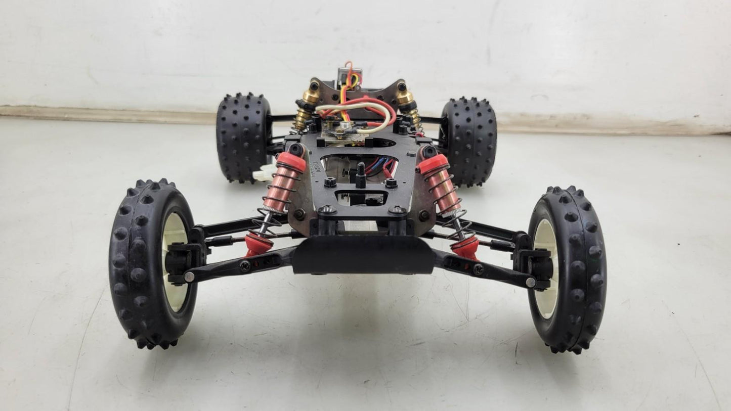 Team Kyosho Ultima 1/10th scale buggy, black and red