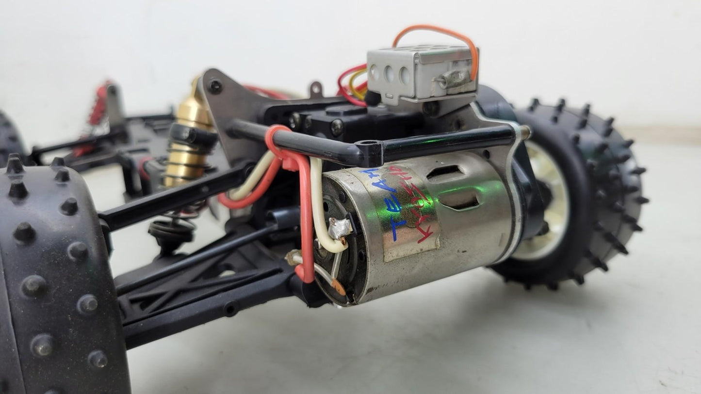 Team Kyosho Ultima 1/10th scale buggy, black and red