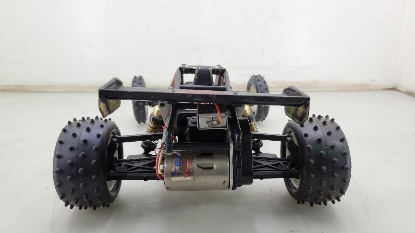 Team Kyosho Ultima 1/10th scale buggy, black and red