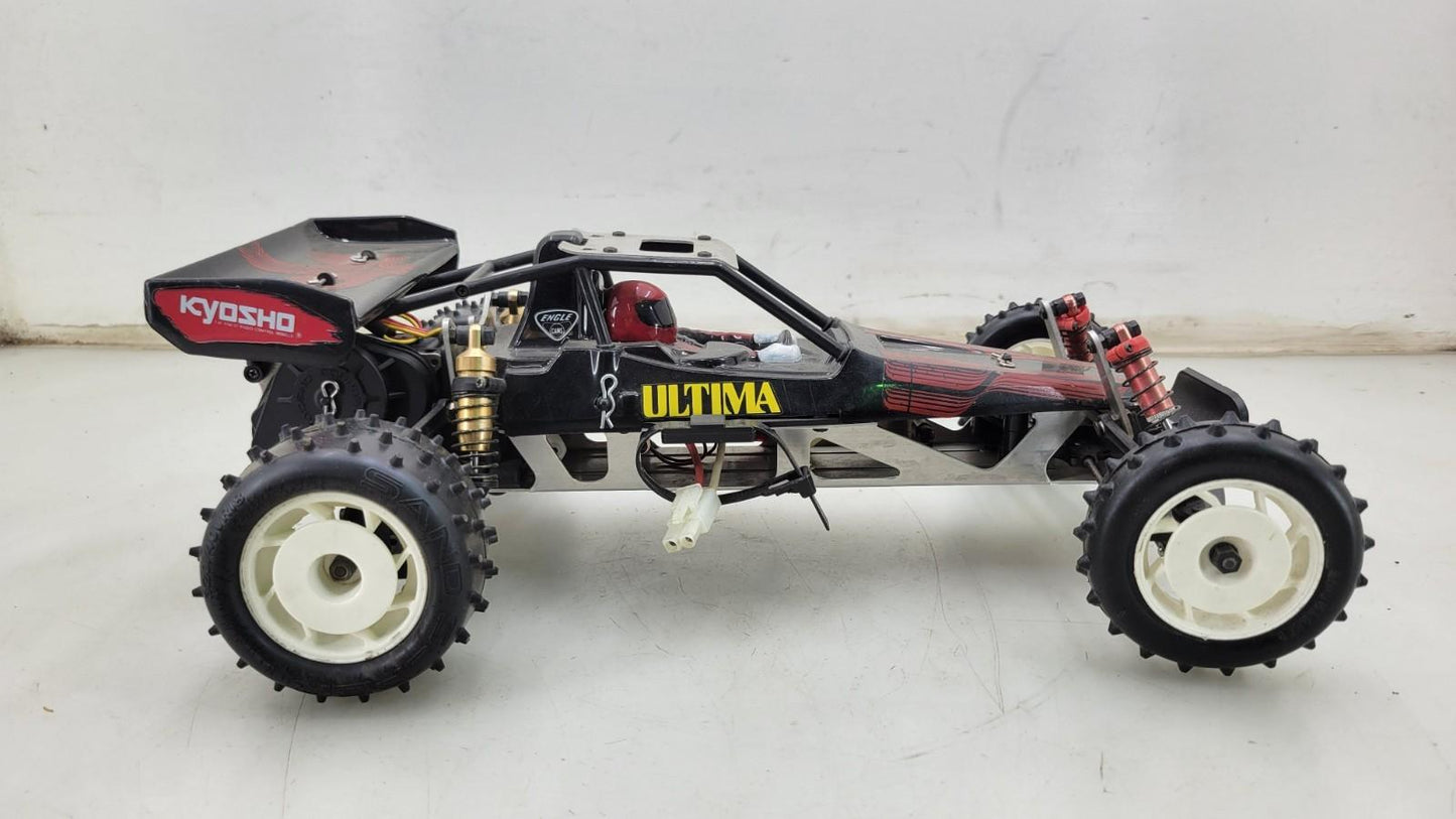 Team Kyosho Ultima 1/10th scale buggy, black and red