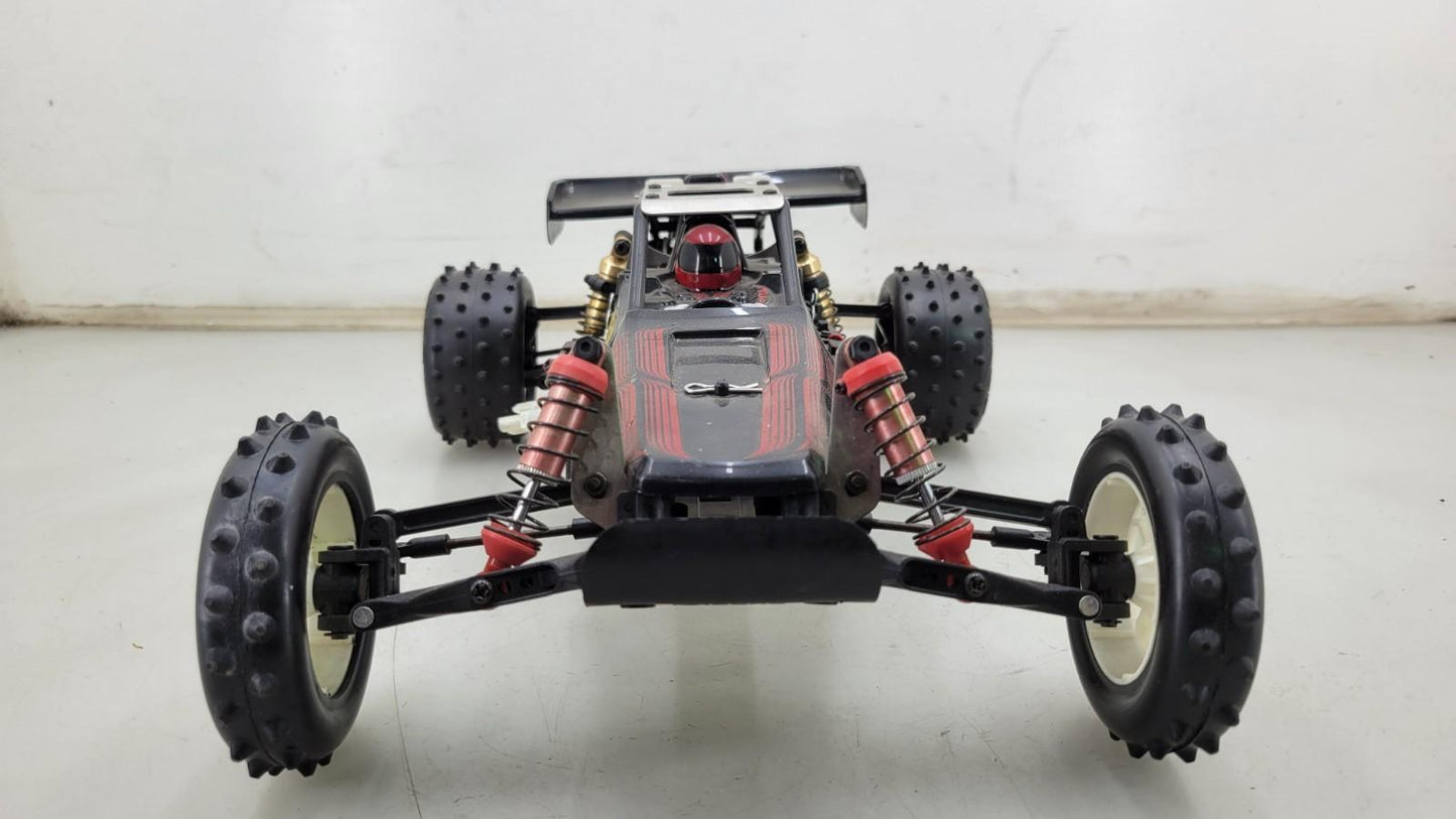 Team Kyosho Ultima 1/10th scale buggy, black and red
