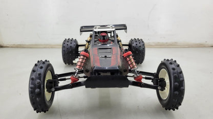 Team Kyosho Ultima 1/10th scale buggy, black and red