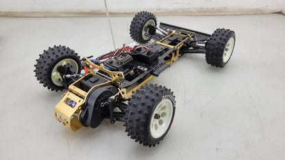 Kyosho Optima off-road racer gold chassis 1/10th scale, no transmitter, as is
