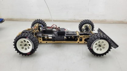 Kyosho Optima off-road racer gold chassis 1/10th scale, no transmitter, as is