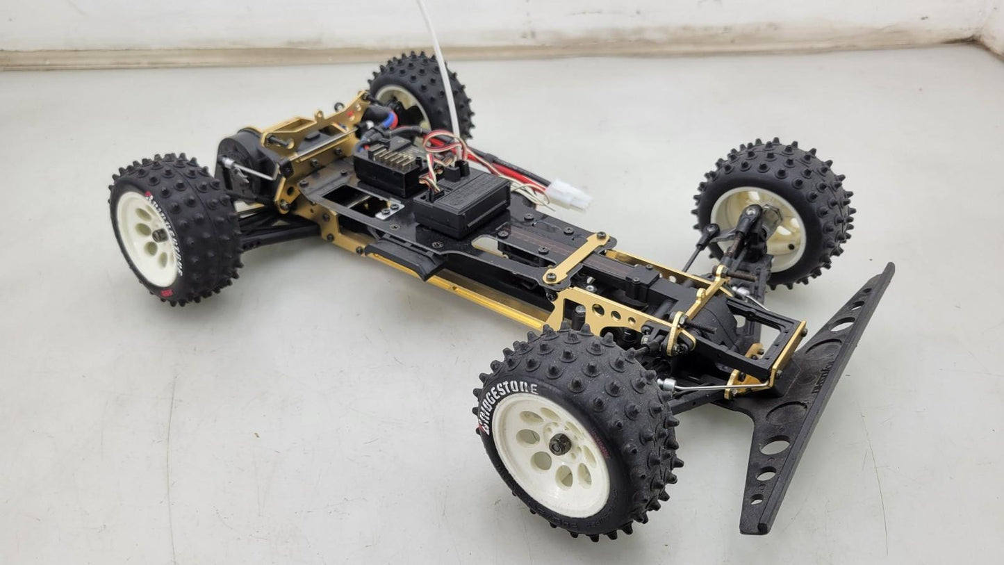 Kyosho Optima off-road racer gold chassis 1/10th scale, no transmitter, as is