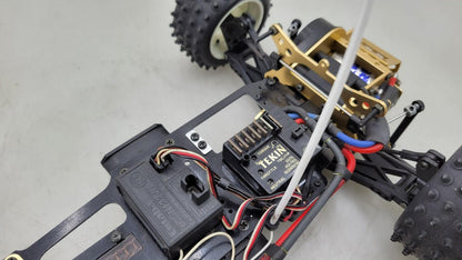 Kyosho Optima off-road racer gold chassis 1/10th scale, no transmitter, as is