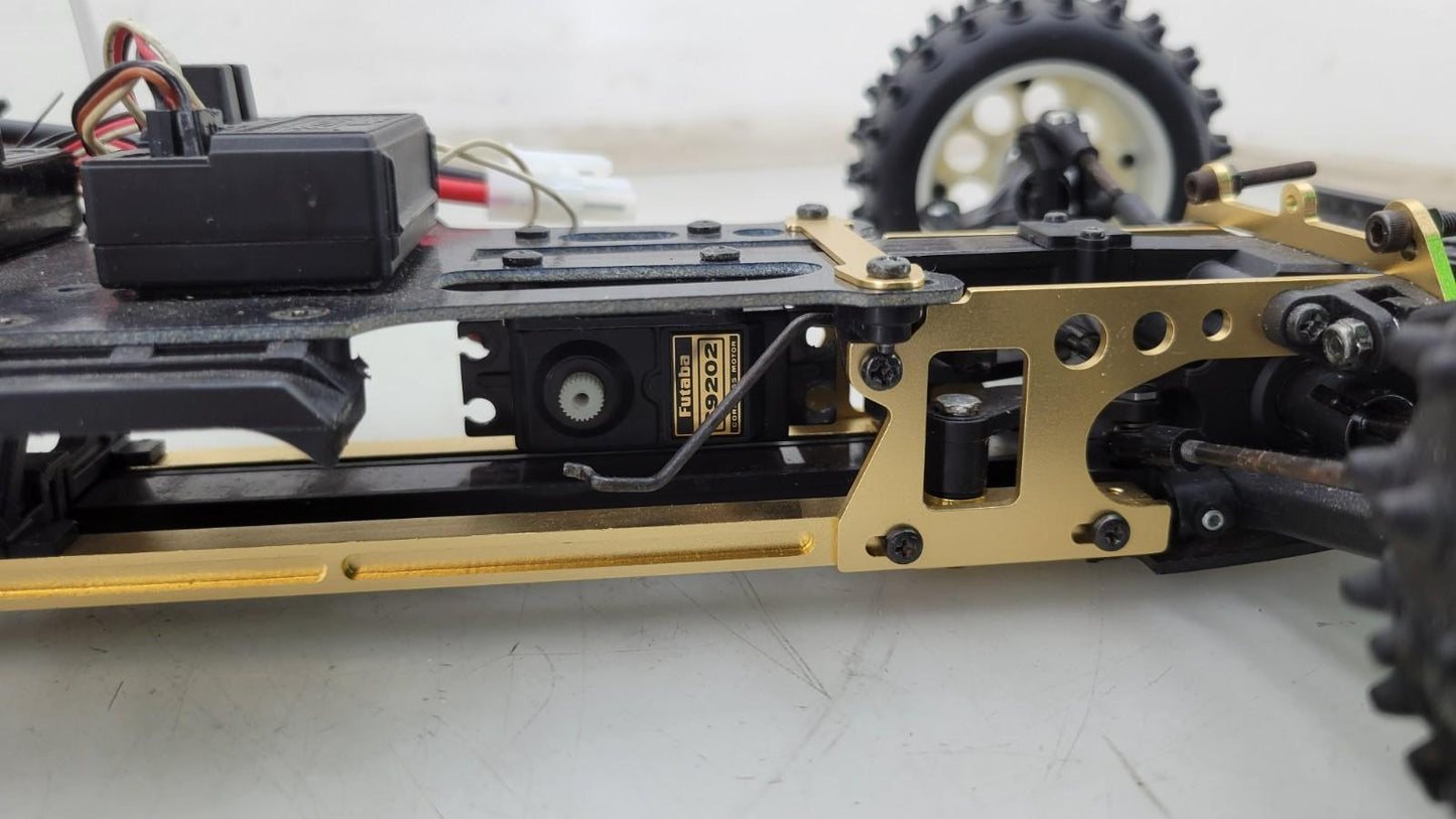 Kyosho Optima off-road racer gold chassis 1/10th scale, no transmitter, as is