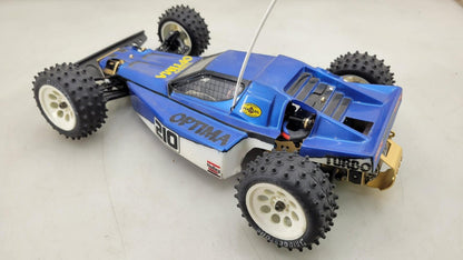 Kyosho Optima off-road racer gold chassis 1/10th scale, no transmitter, as is
