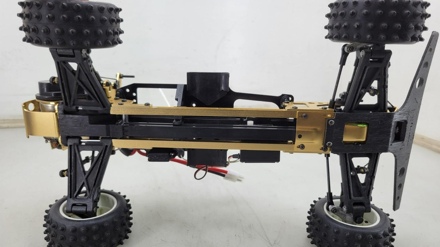 Kyosho Optima off-road racer gold chassis 1/10th scale, no transmitter, as is