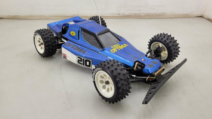 Kyosho Optima off-road racer gold chassis 1/10th scale, no transmitter, as is
