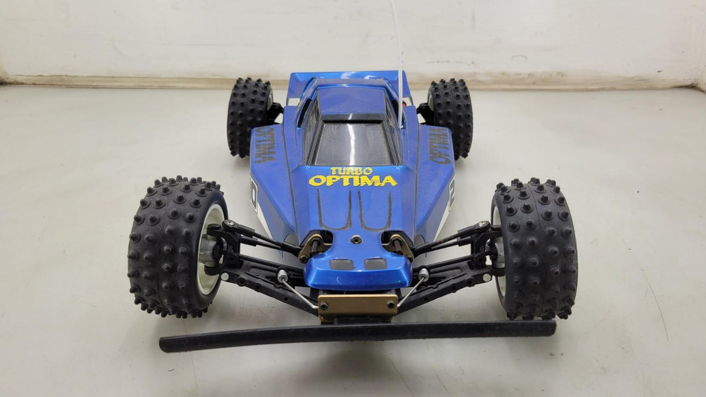 Kyosho Optima off-road racer gold chassis 1/10th scale, no transmitter, as is