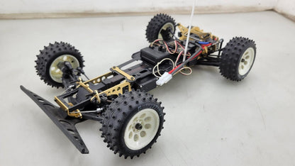 Kyosho Optima off-road racer gold chassis 1/10th scale, no transmitter, as is